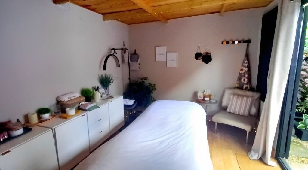 Relaxing therapy room at On Cloud Nine Therapies, Godalming, England, GB, featuring a cozy treatment table.