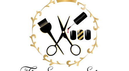 Elegant logo of The Scissor Shoppe in Worthington, Pennsylvania, with gold accents for beauty and wellness.
