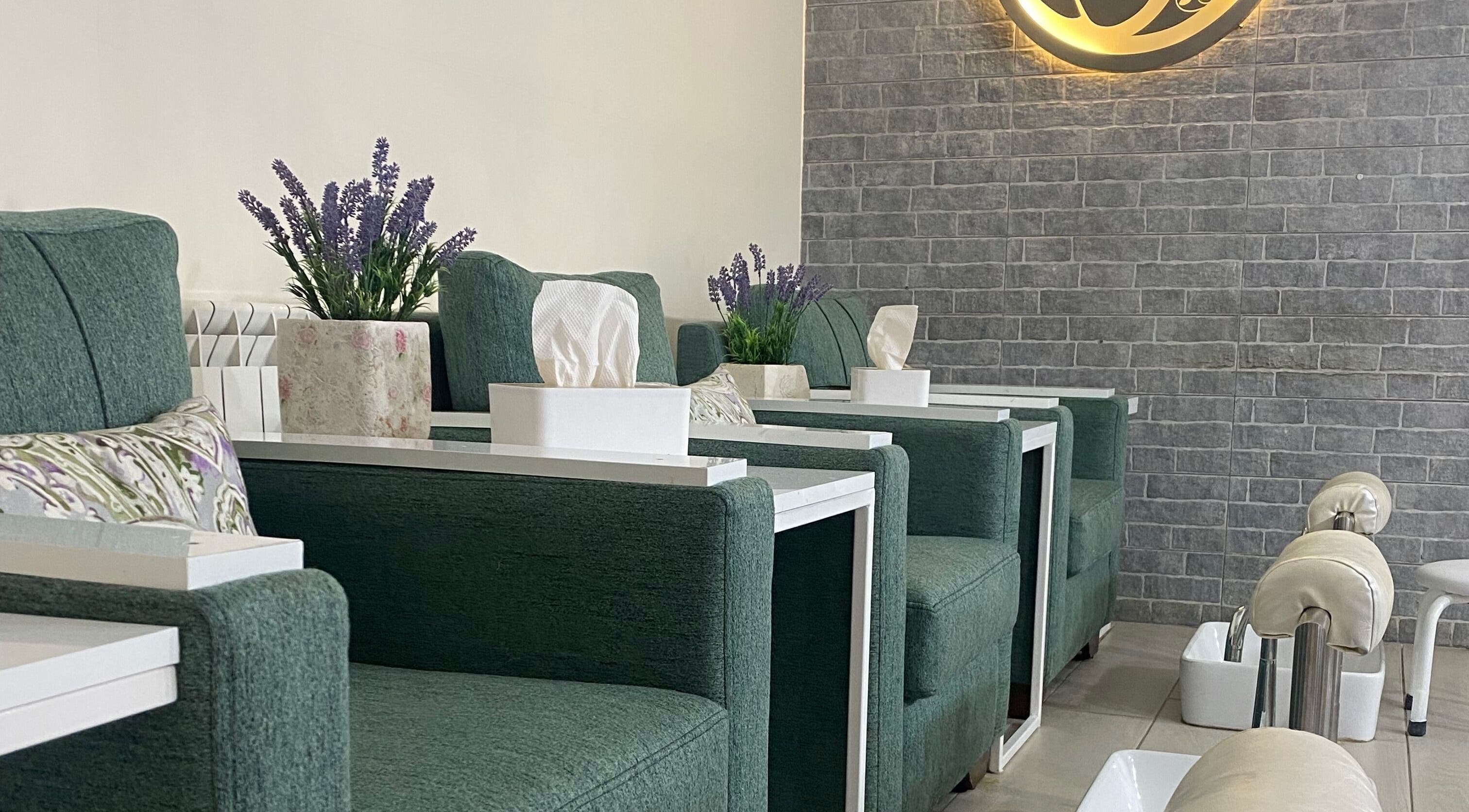 Elegant green chairs and lavender decor at Sasha Nails and Body, Baakleen, Mount Lebanon Governorate, LB.