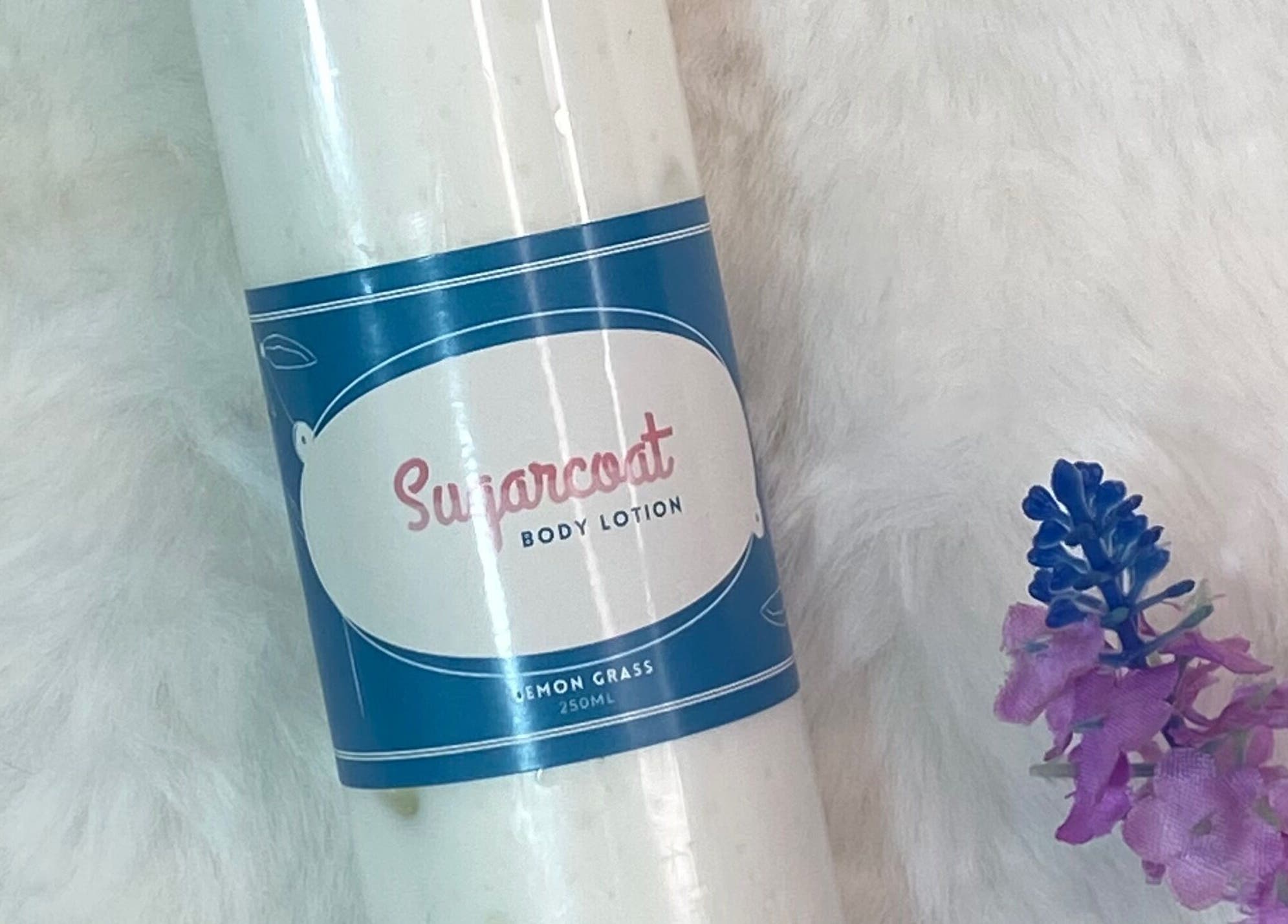 Sugarcoat body lotion at Sasha Nails and Body, Baakleen, Mount Lebanon Governorate, LB next to lavender flowers.