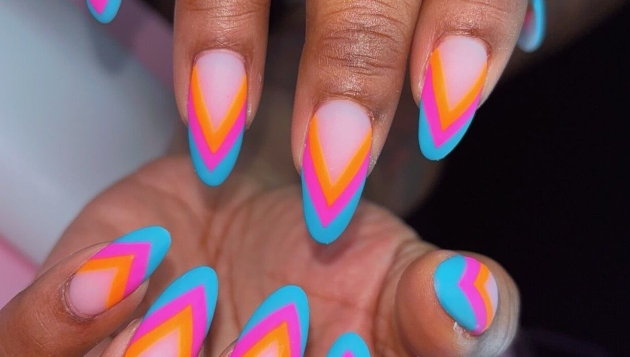 Vibrant multicolor nail art at Claws With Jas in Memphis, Tennessee, US. Perfect for a stylish statement.
