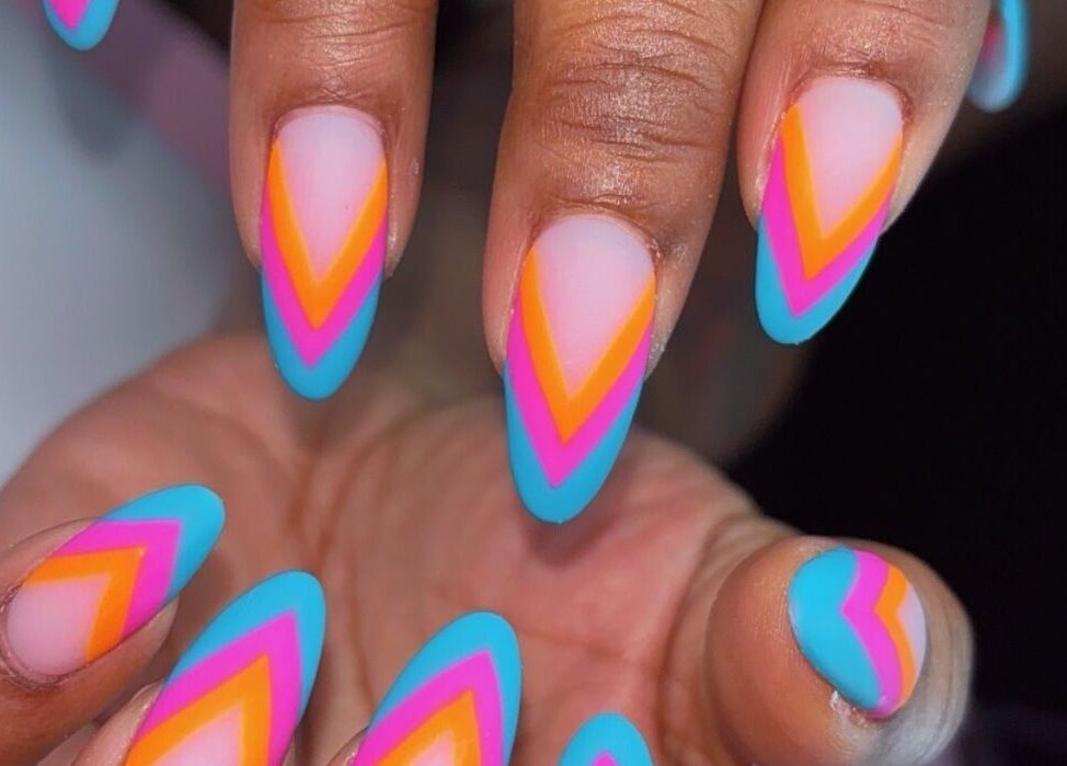 Vibrant multicolor nail art at Claws With Jas in Memphis, Tennessee, US. Perfect for a stylish statement.