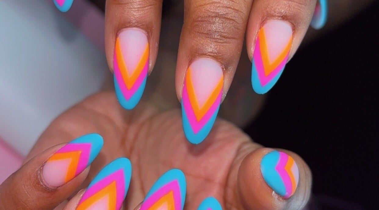 Vibrant multicolor nail art at Claws With Jas in Memphis, Tennessee, US. Perfect for a stylish statement.