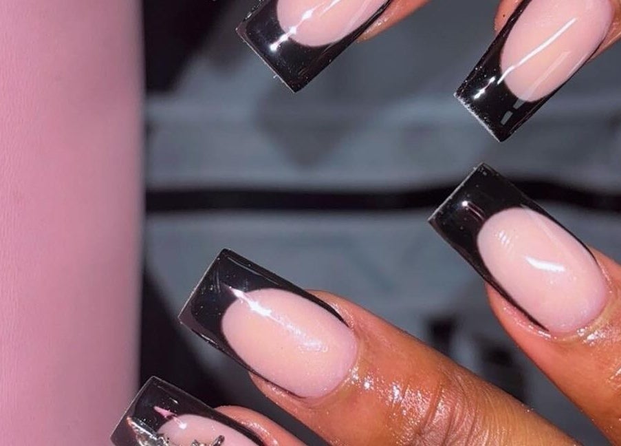 Stylish black-tipped nails at Claws With Jas in Memphis, Tennessee, US showcase elegance and precision.