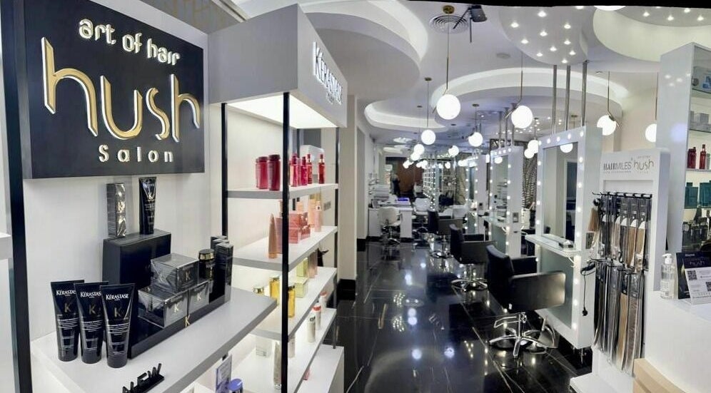 Modern interior of Hush Salon Sofitel Hotel JBR, Dubai, Dubai, AE, showcasing sleek design and hair products.