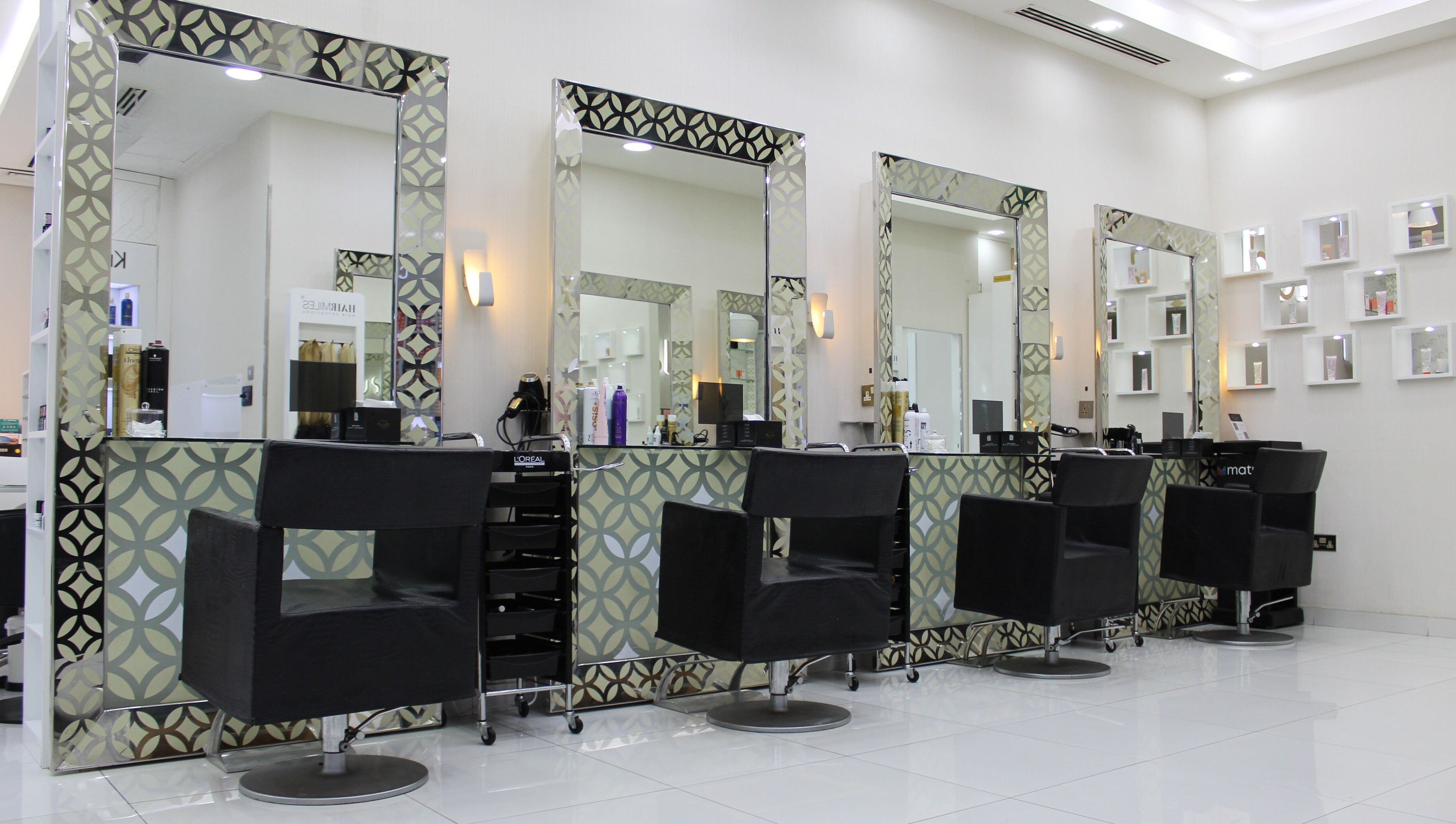 Modern salon mirrors at Hush Salon Kempinski Central Avenue of Dubai, Dubai, Dubai, AE, create an elegant look.
