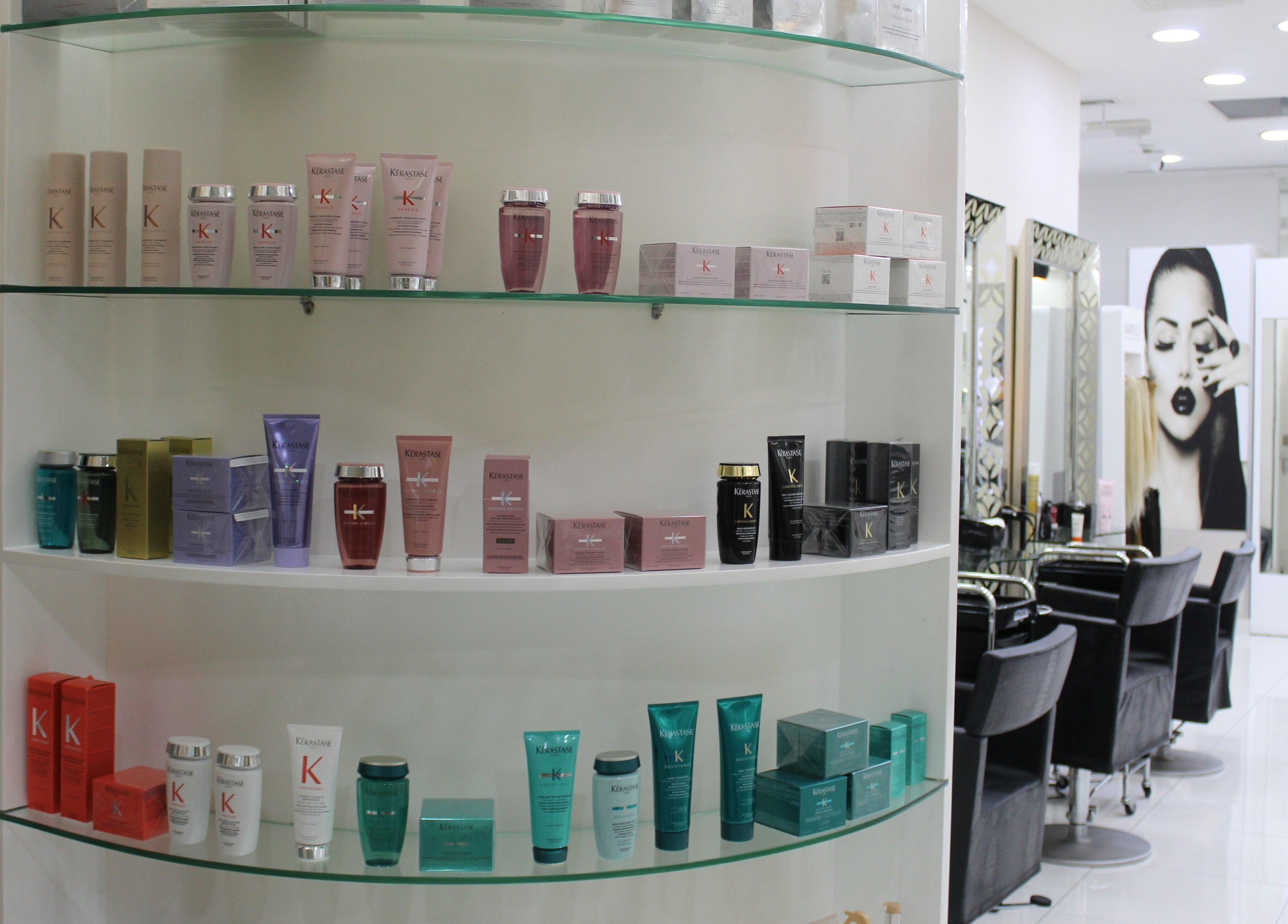 Product shelves at Hush Salon Kempinski Central Avenue of Dubai, Dubai, AE showcasing luxurious beauty items.