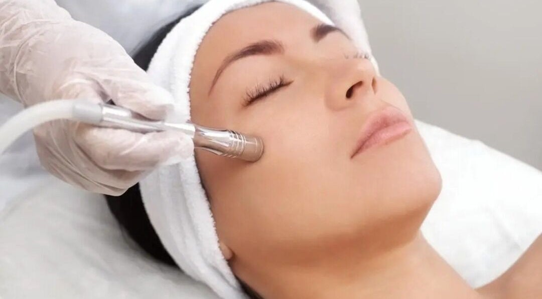Facial treatment at Replenish Beauty, Ironbank, South Australia, AU, showcasing expert skincare service.