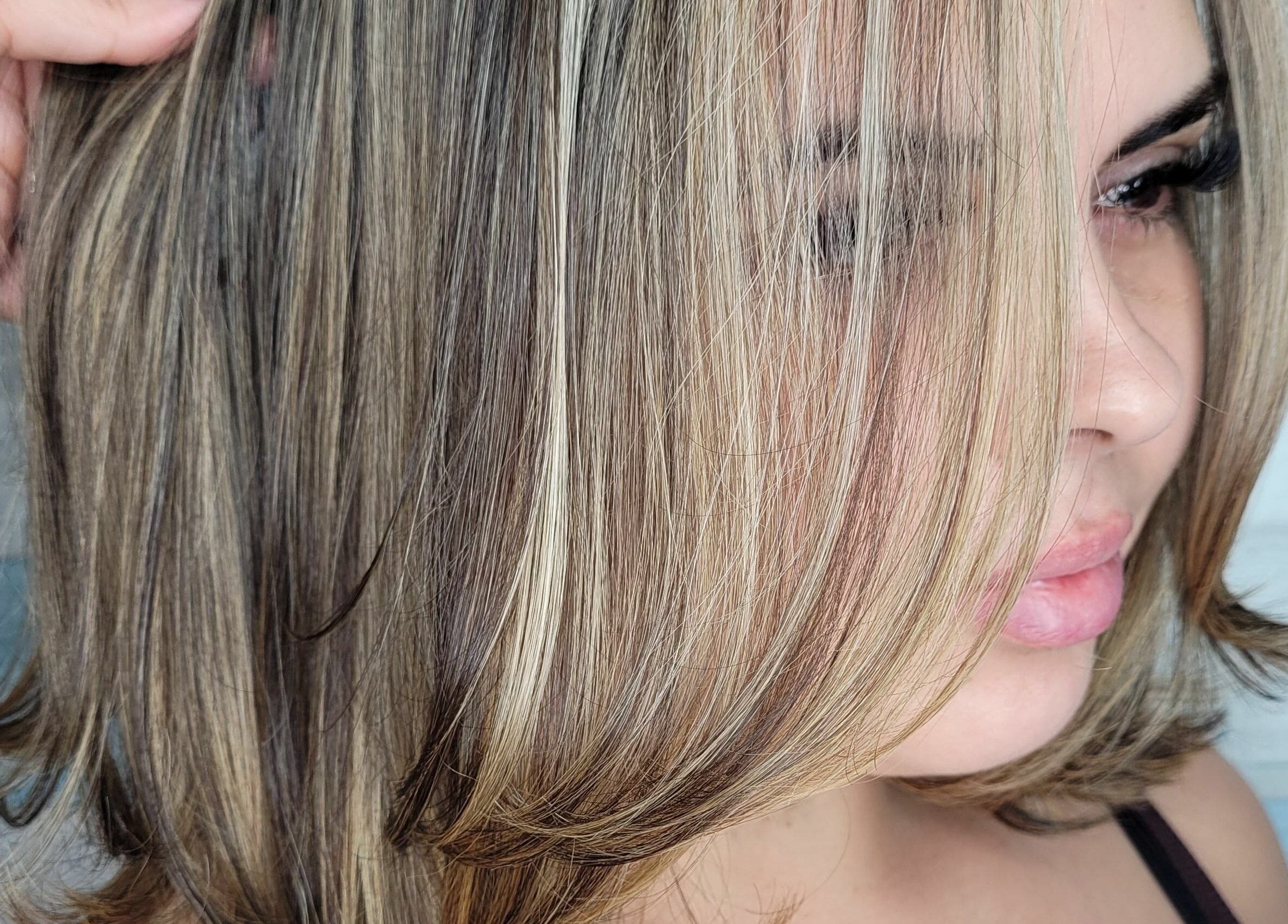 Blonde highlights styled at Gemproimage, Miami, Florida, US.
