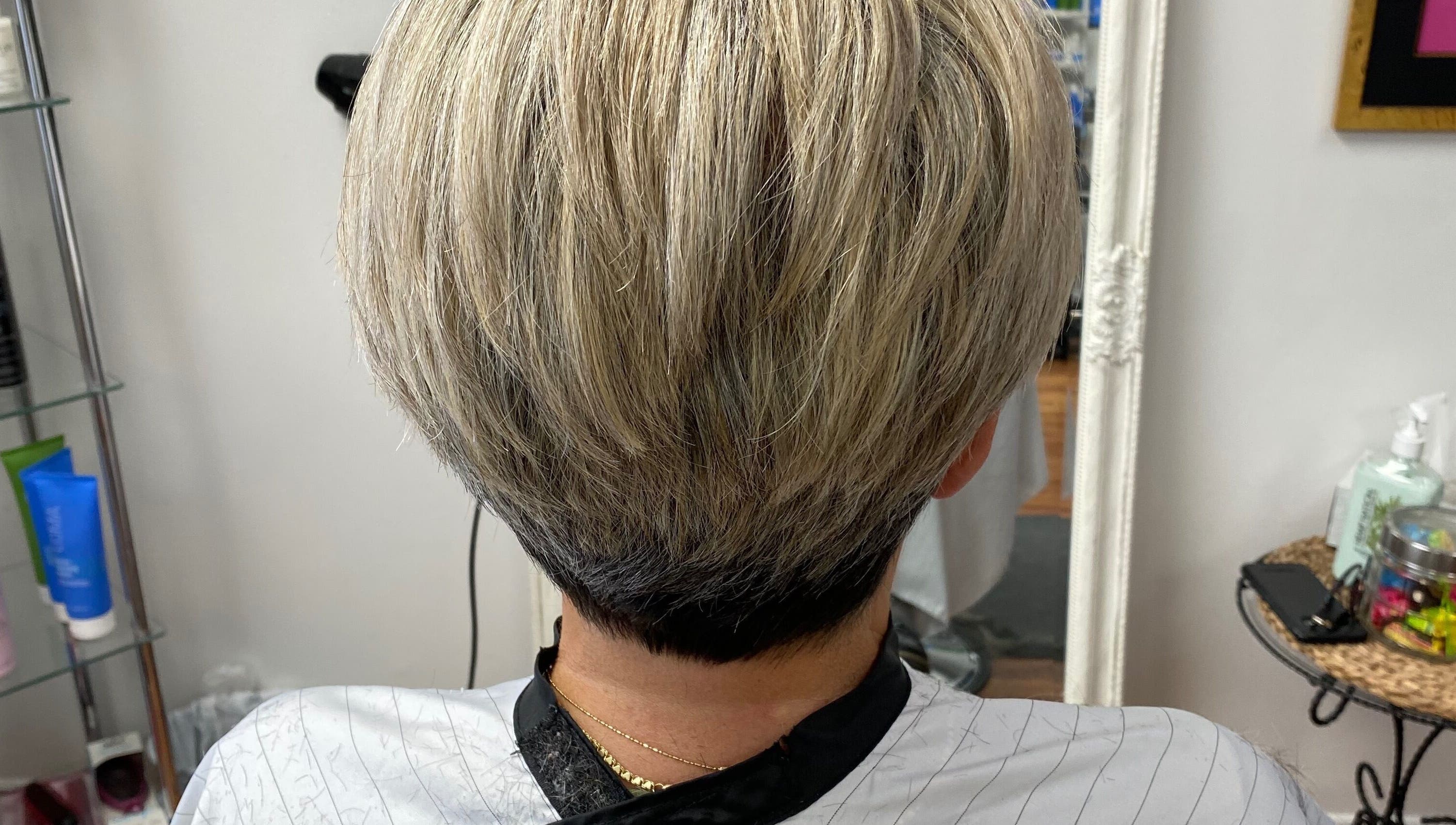 Modern blonde bob haircut at Rose Robson Hair salon in Kelowna, British Columbia, CA, showcasing sleek style.