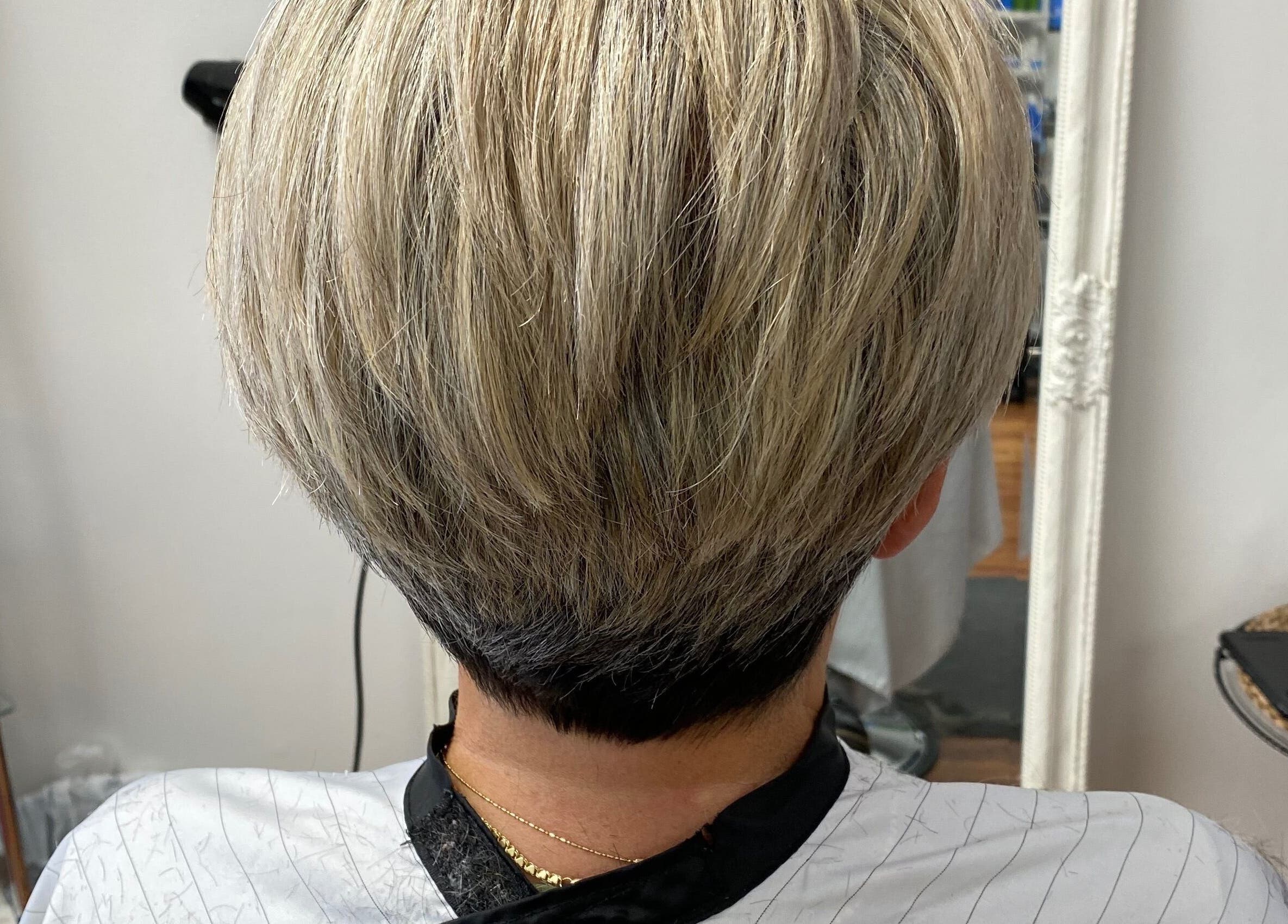 Modern blonde bob haircut at Rose Robson Hair salon in Kelowna, British Columbia, CA, showcasing sleek style.