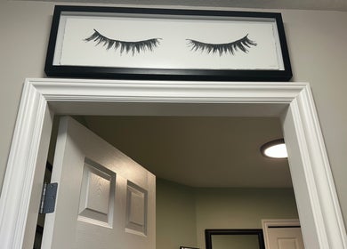 Eyelash artwork above the entrance of Honey Lashes by V in Nanaimo, British Columbia, CA.