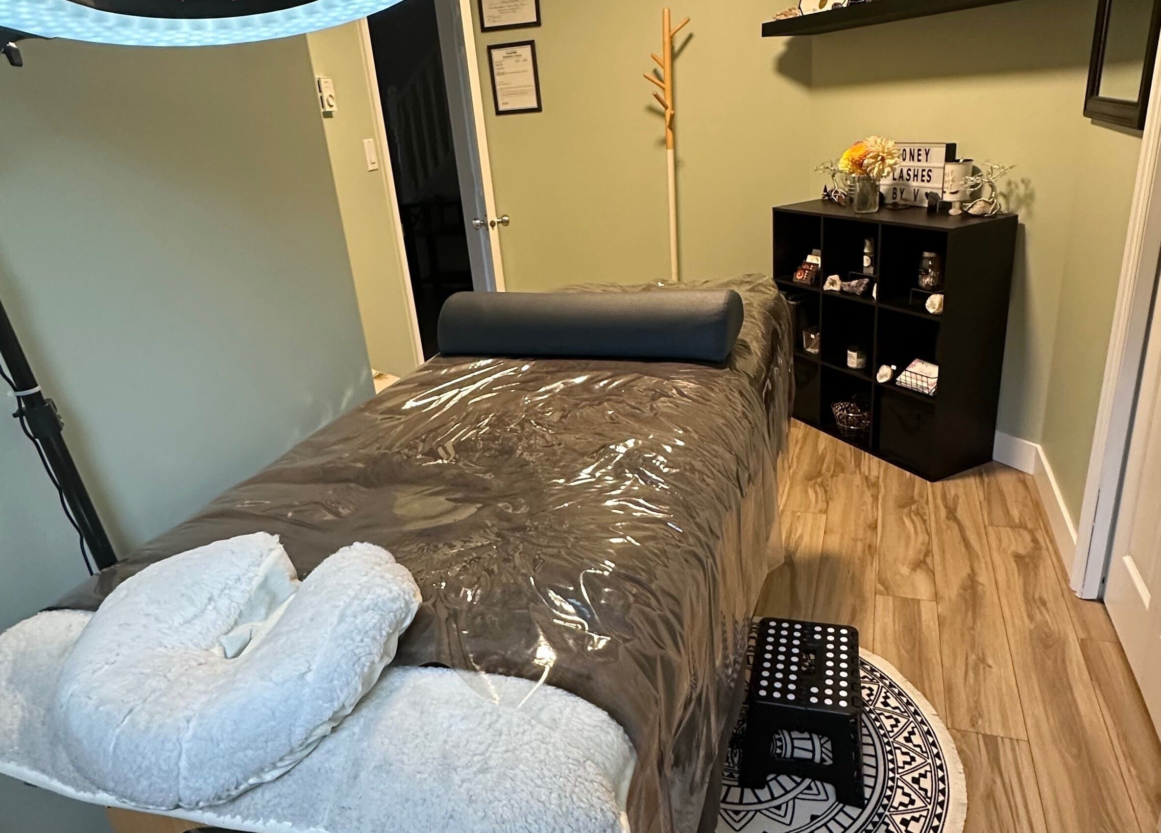Calm treatment room at Honey Lashes by V in Nanaimo, British Columbia, CA with a plush bed and soothing decor.