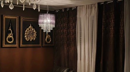 Elegant decor with chandelier and art at Sasinan Thai Spa, Sherwood, Queensland, AU.