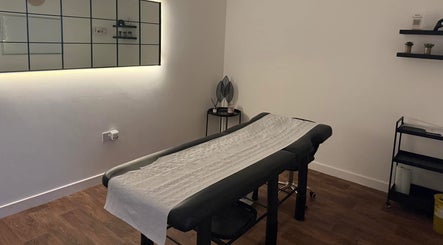 Calm and inviting massage room at The Brow Barn, Middleton, England, GB, ready for relaxation.