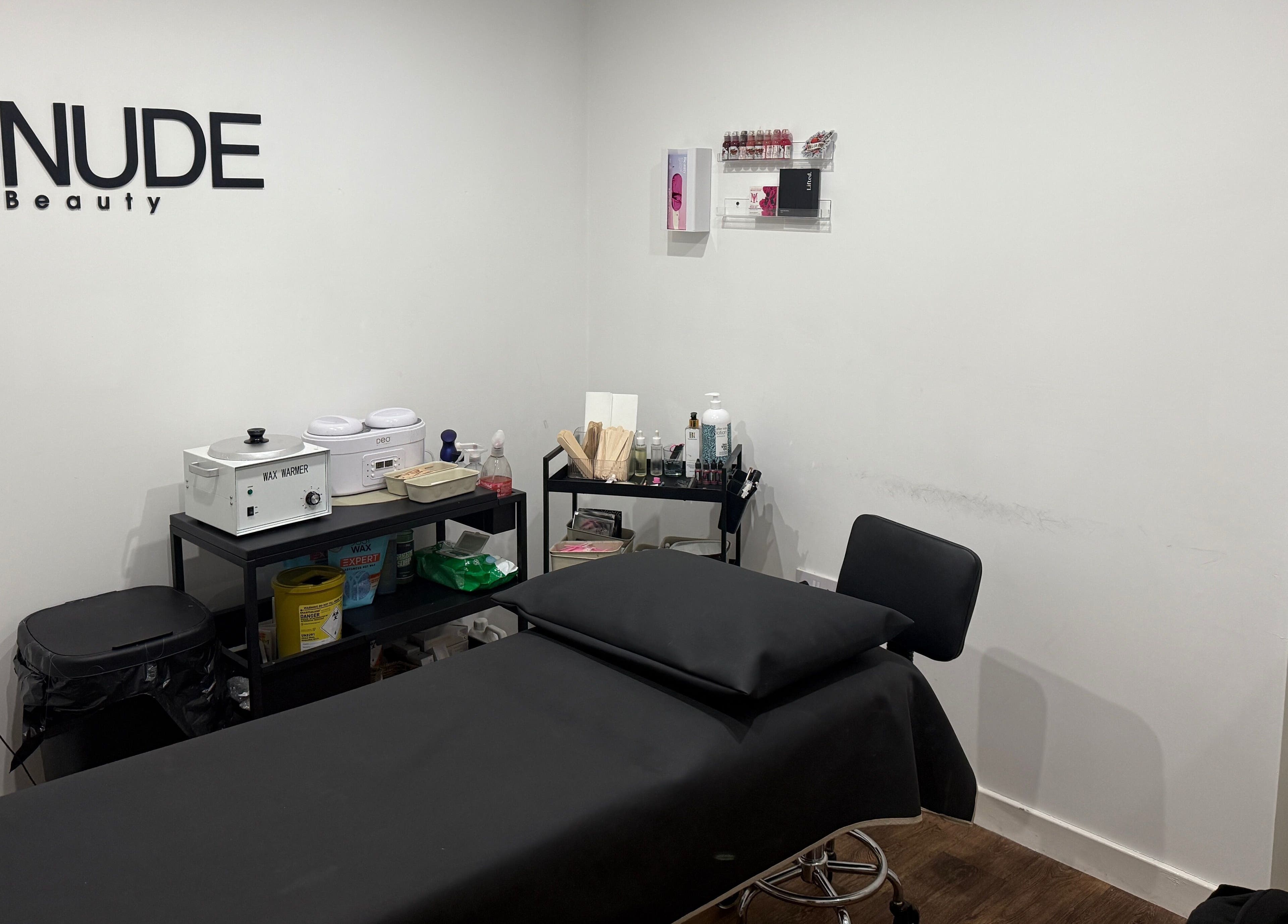 Well-equipped waxing room at The Brow Barn, Middleton, England, GB featuring a treatment bed and professional tools.