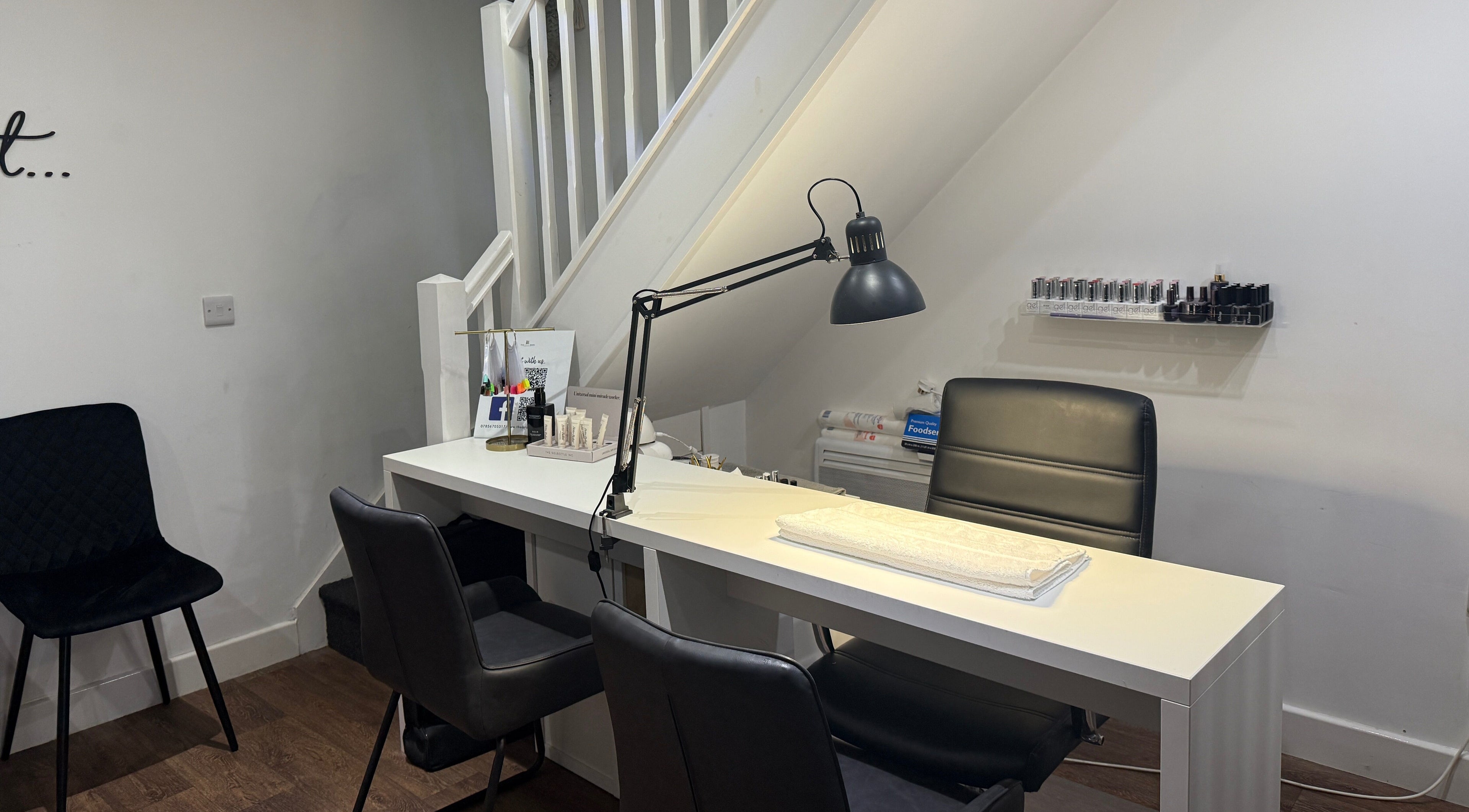 Manicure station at The Brow Barn, Middleton, England, GB, with chairs and nail tools for a relaxing treatment.