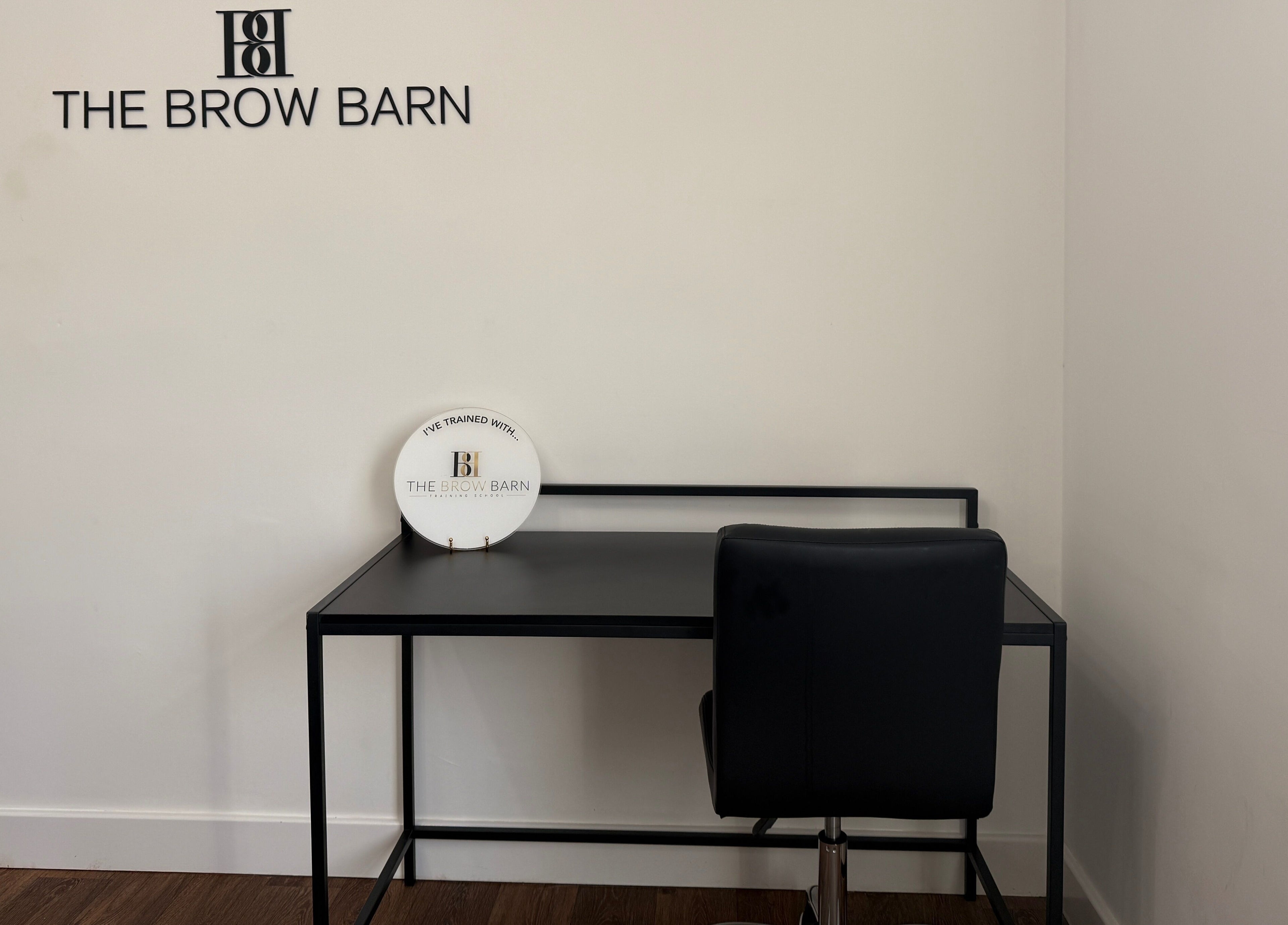 Minimalist desk at The Brow Barn, Middleton, England, GB for beauty consultations.
