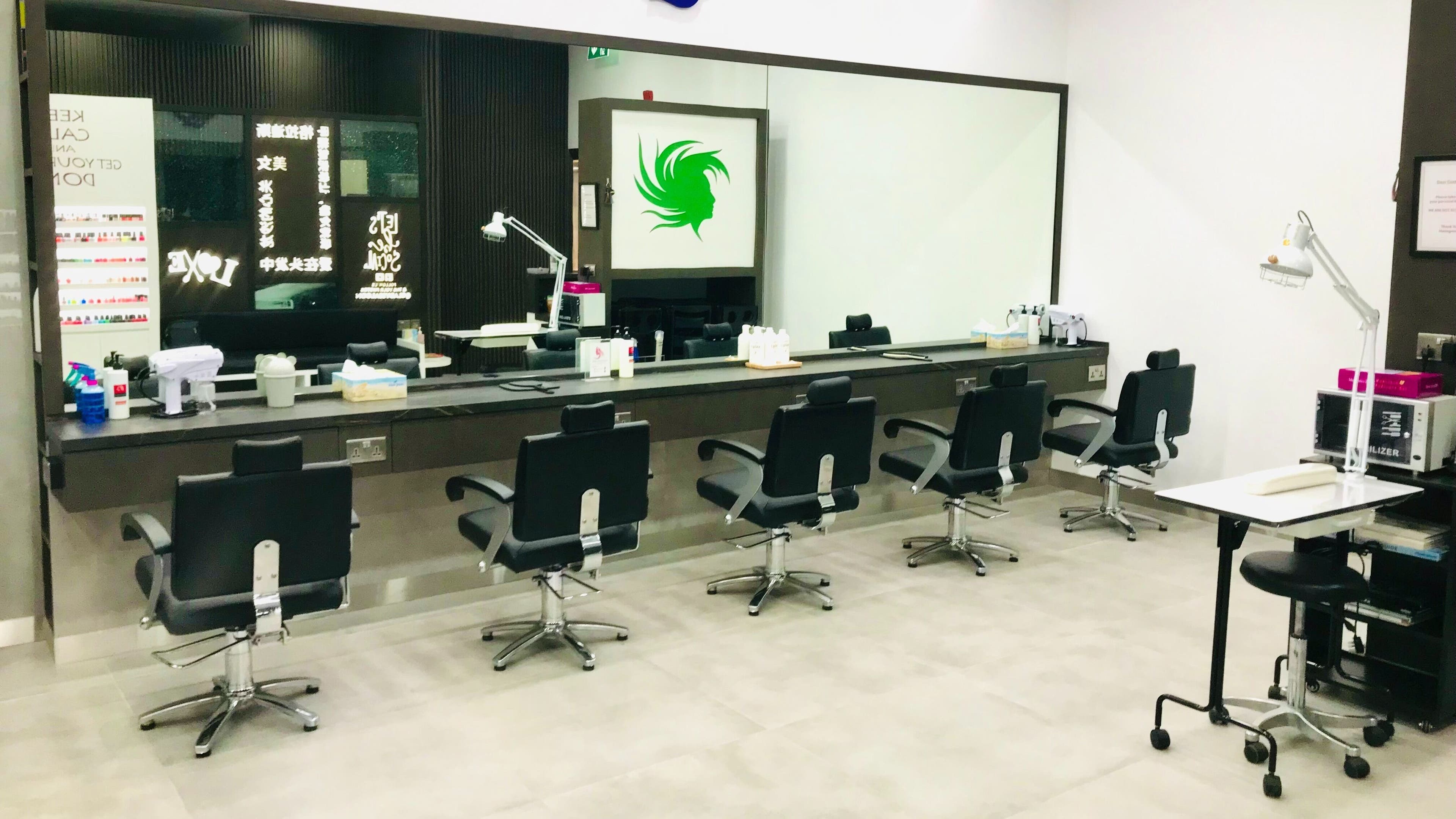 Modern salon chairs and workstations at Gladys Marina Branch, Dubai, AE, exemplifying stylish design.