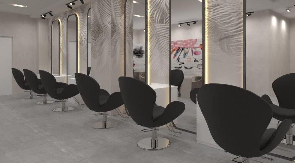 Modern salon interior at Gladys Motor City Branch, Dubai, Dubai, AE, featuring sleek black chairs and mirrors.