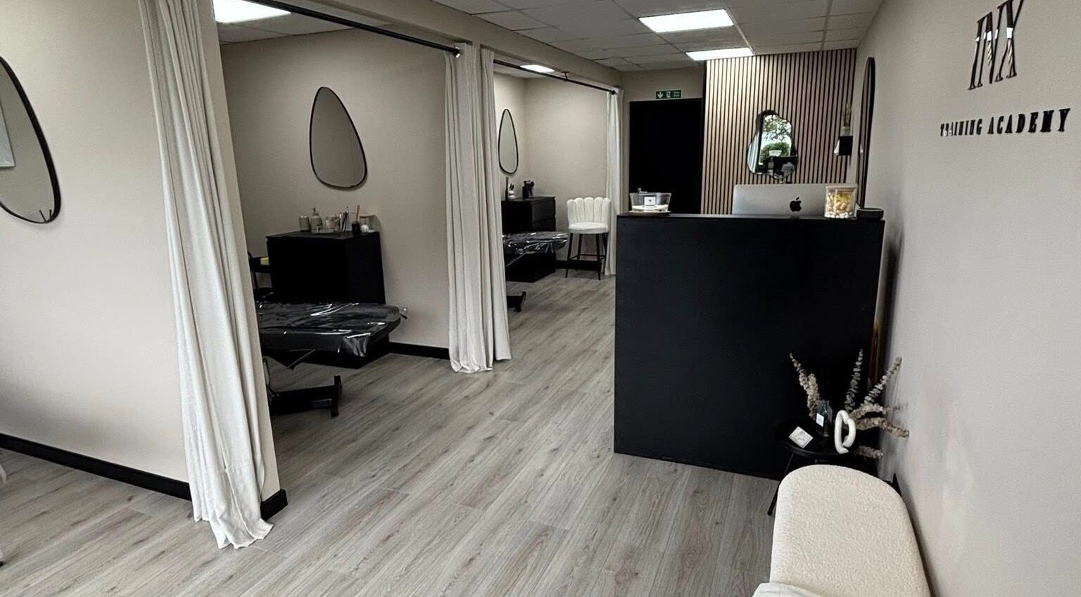 Modern interior of INX Cosmetics, Great Wyrley, England, GB, featuring elegant decor and welcoming spaces.