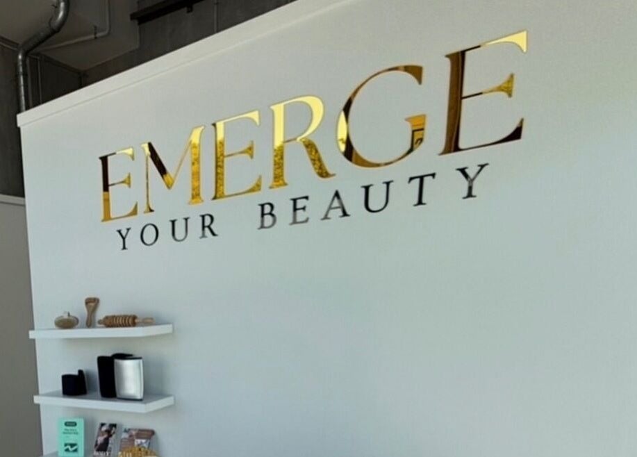 Interior wall with 'EMERGE Your Beauty' at Blink & Ink Tawa, Wellington, Wellington Region, NZ.
