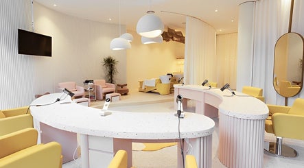 Modern salon at COCOdry KLCC, Kuala Lumpur, with pastel decor and sleek design.