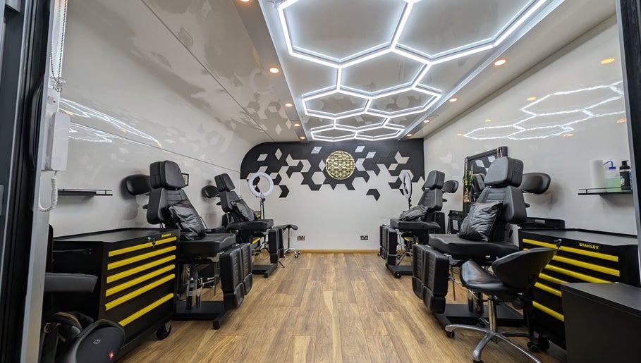 Chic interior of Organic Joy Tattoo in Dublin, County Dublin, IE with modern decor and tattoo chairs.