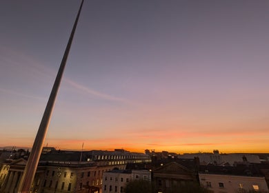 Sunset over Dublin near Organic Joy Tattoo, showcasing a vibrant sky, County Dublin, IE.