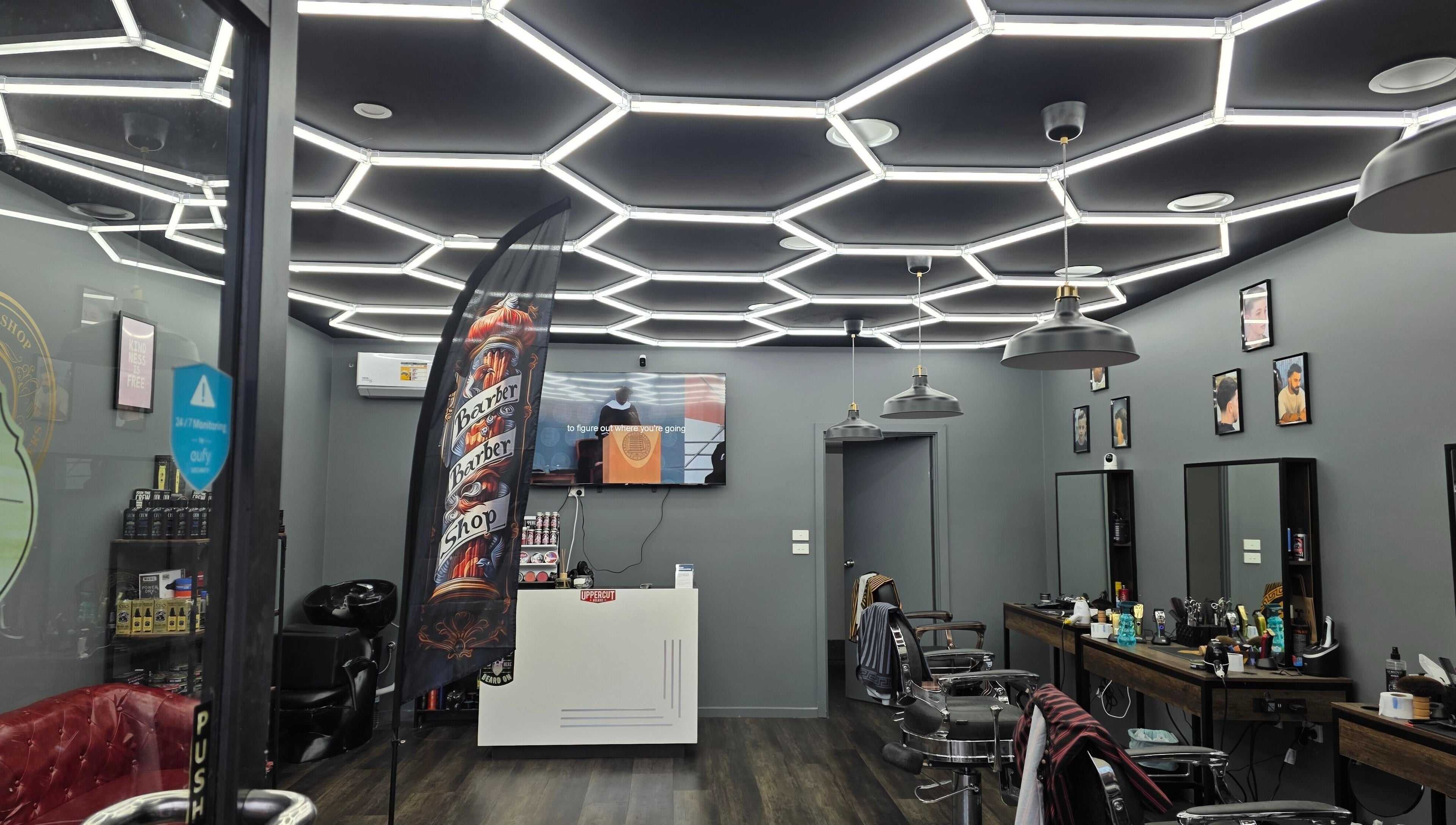 Modern barber shop interior at 4/22 Jardine Street Kingston, featuring stylish lighting and setup, Kingston, AU.