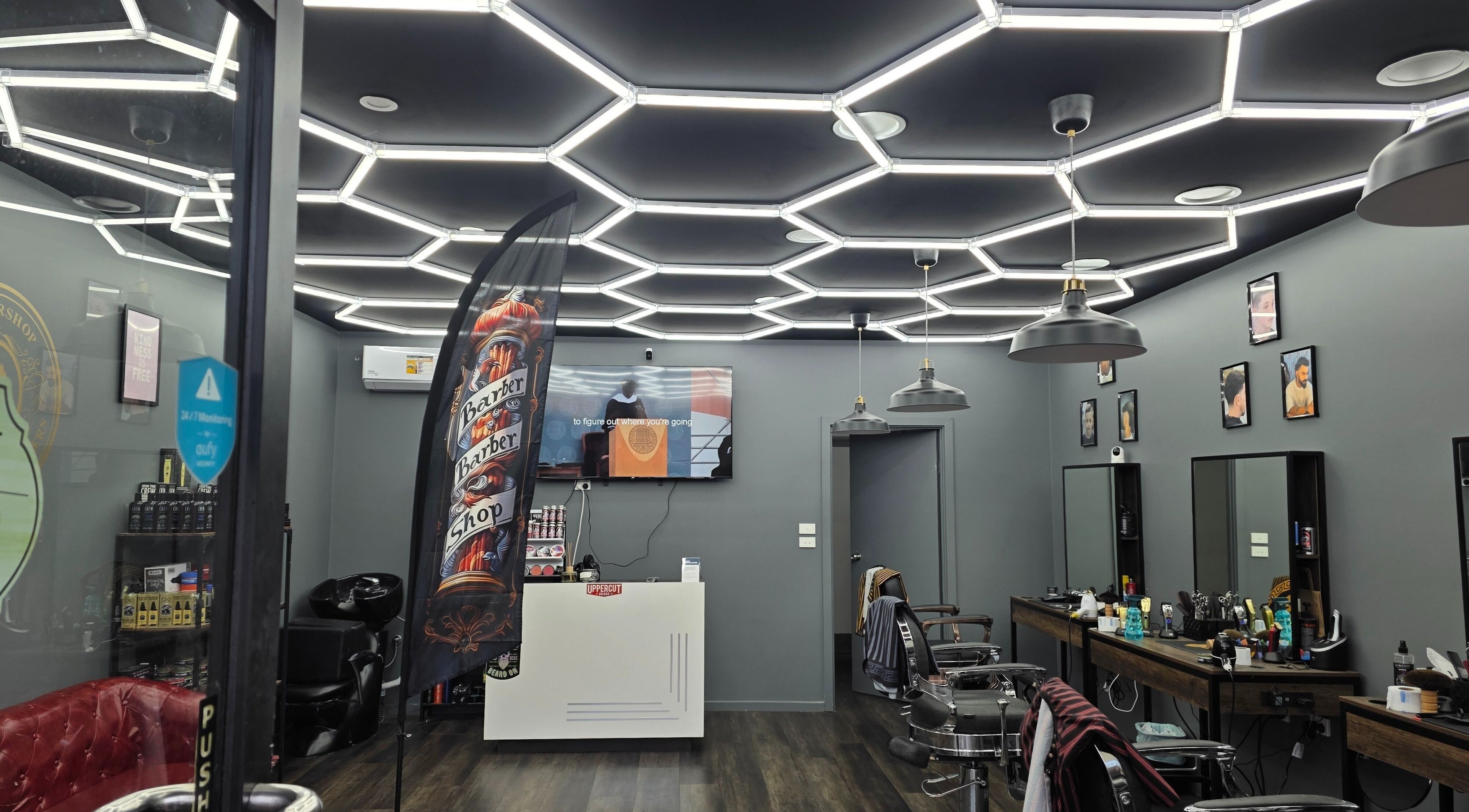 Modern barber shop interior at 4/22 Jardine Street Kingston, featuring stylish lighting and setup, Kingston, AU.
