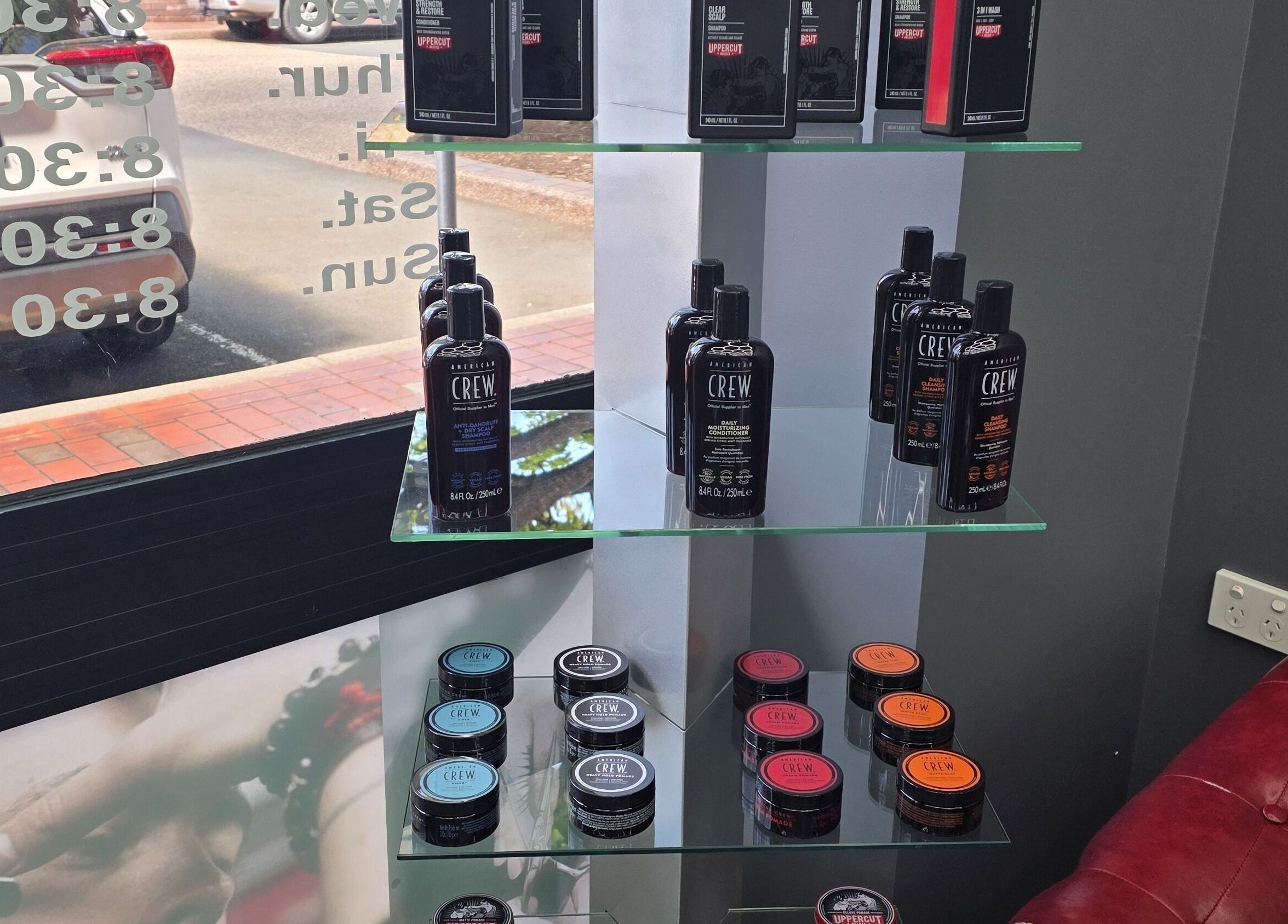 Hair care products displayed on glass shelves at 4/22 Jardine Street Kingston, Australian Capital Territory, AU.