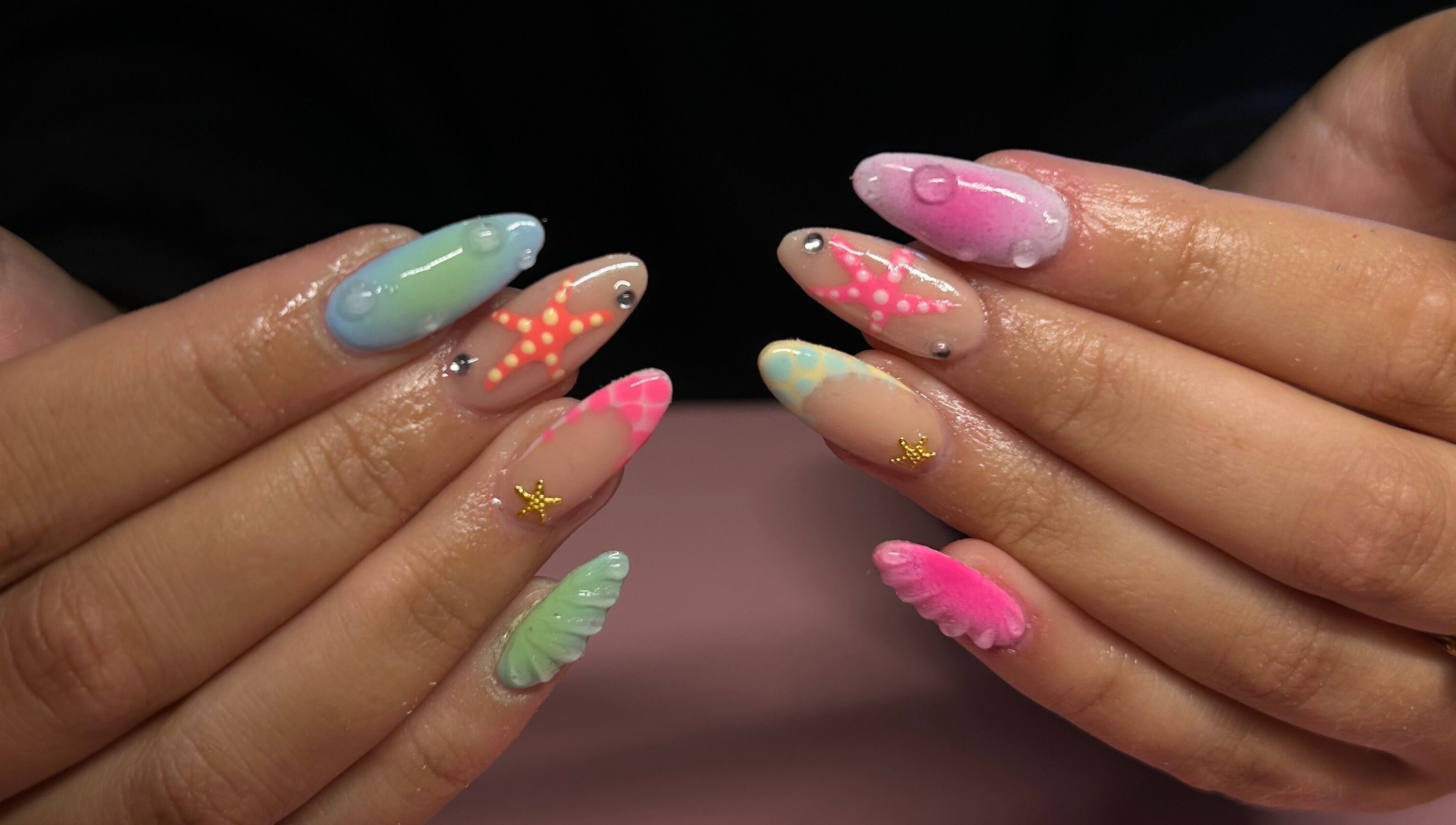 Colorful nail art design at Nails By Mya, Blantyre, Scotland, GB.