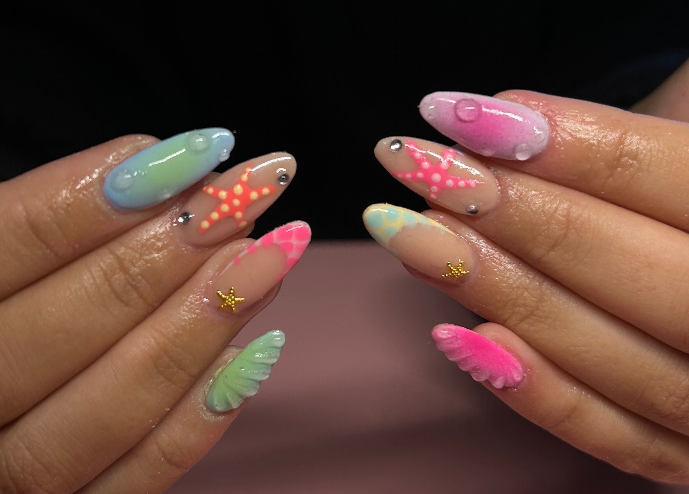 Colorful nail art design at Nails By Mya, Blantyre, Scotland, GB.