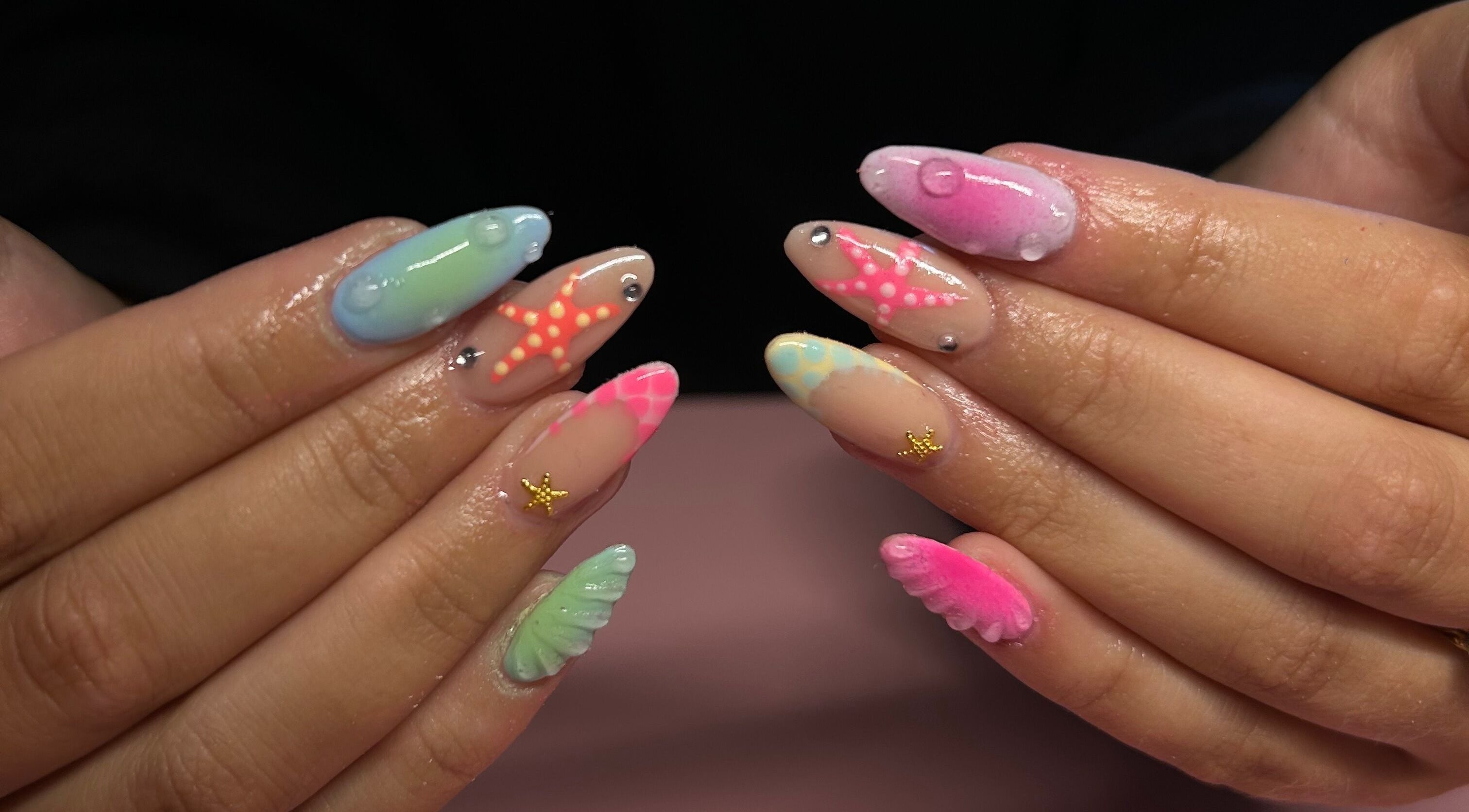 Colorful nail art design at Nails By Mya, Blantyre, Scotland, GB.