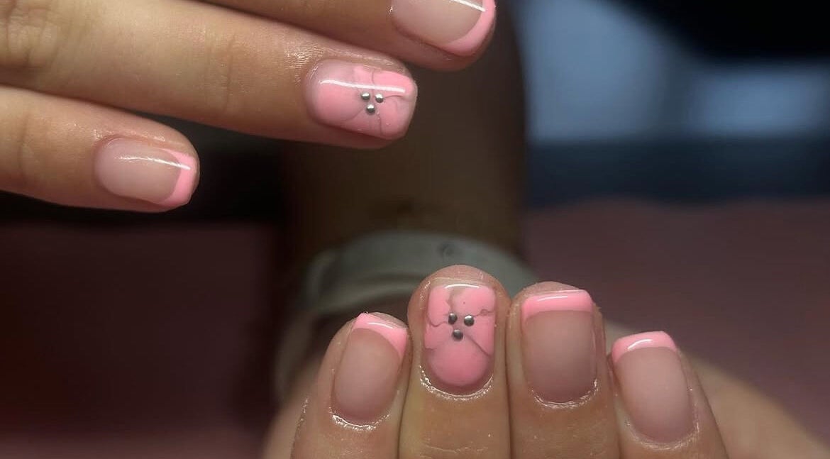 Pink manicure with delicate design at Nails By Mya, Blantyre, Scotland, GB.