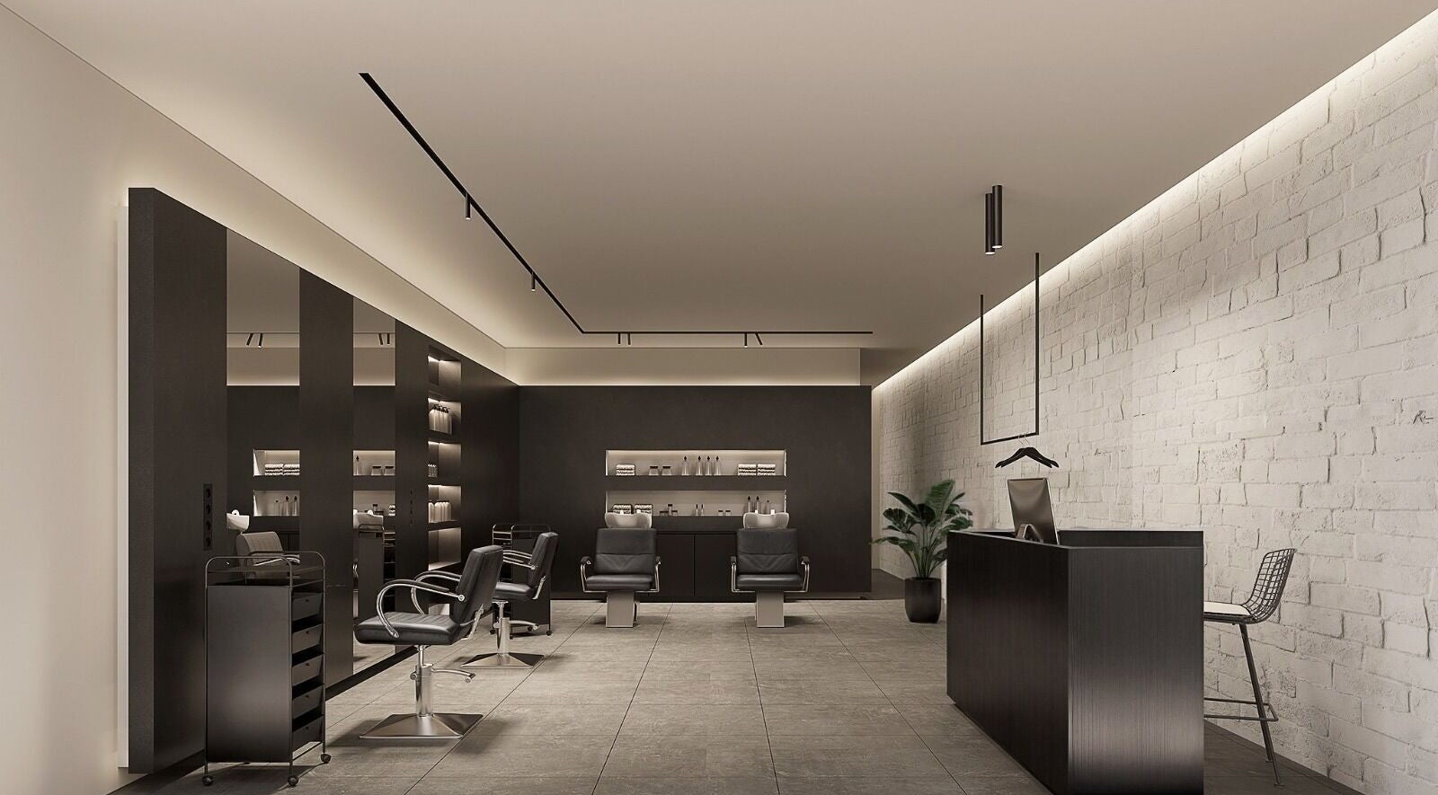 Moderno interno di GTM Hair Studio a Montelupo Fiorentino, Toscana, IT con postazioni stilistiche eleganti.