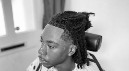 Close-up of a detailed haircut showcasing dreadlocks at LMBlendz, Birmingham, England, GB.