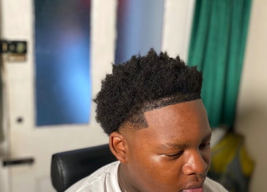 Close-up of a fresh fade haircut at LMBlendz in Birmingham, England, GB. Highlighting professional barbering skills.