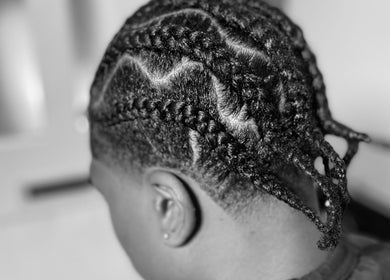 Close-up of detailed braiding at LMBlendz, Birmingham, England, GB, showcasing expert styling techniques.