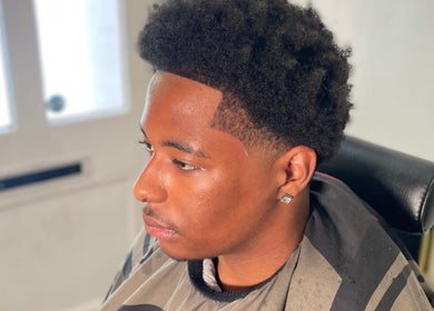 Fresh haircut at LMBlendz salon, Birmingham, England, GB, showcasing precision styling.