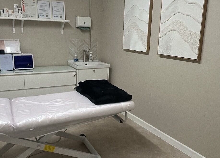 Calm treatment room at Skin Clinic By Samantha in Lydney, England, GB with a prepared therapy bed and soft decor.