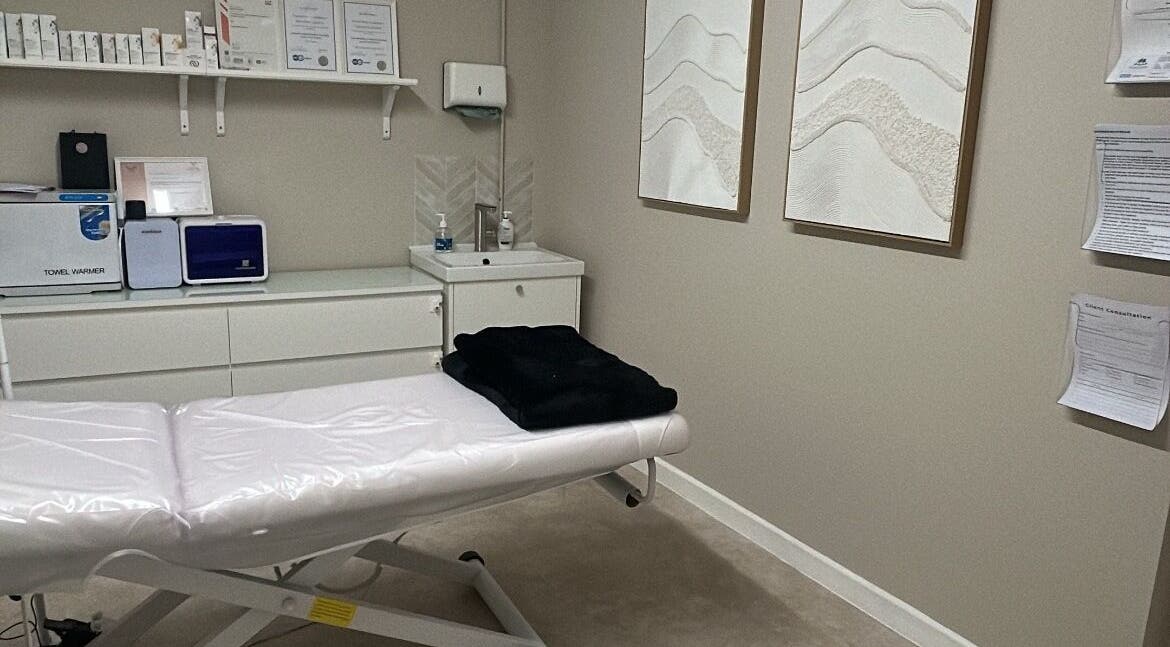 Calm treatment room at Skin Clinic By Samantha in Lydney, England, GB with a prepared therapy bed and soft decor.