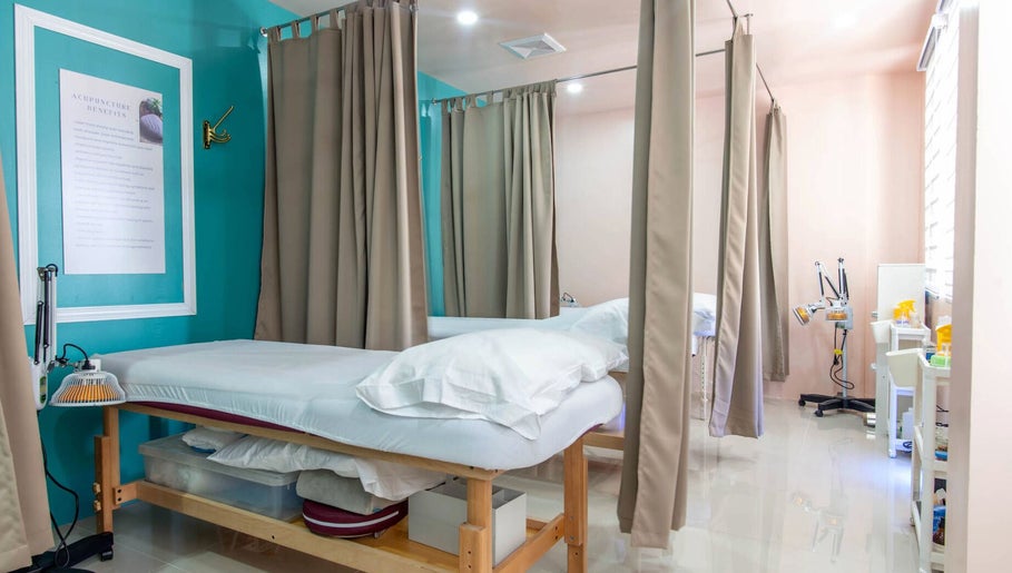Calm treatment room at Acuholistic Health Center, Quezon City, Metro Manila, PH, featuring therapy beds.