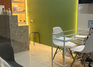 Reception area at Acuholistic Health Center, Quezon City, Metro Manila, PH, showcasing sleek design and modern decor.