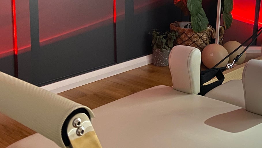 Cozy Pilates setup with red lighting at Pilates with Chloe, Safety Bay, Western Australia, AU.