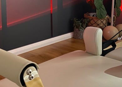 Cozy Pilates setup with red lighting at Pilates with Chloe, Safety Bay, Western Australia, AU.