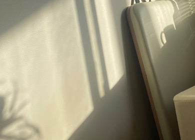Sunlit studio wall creating serene shadows at Pilates with Chloe, Safety Bay, Western Australia, AU.