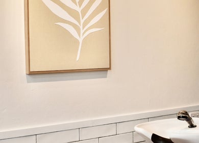 Elegant wash basin and minimalist art at Cherry Luxe & Co, Seaforth, New South Wales, AU.