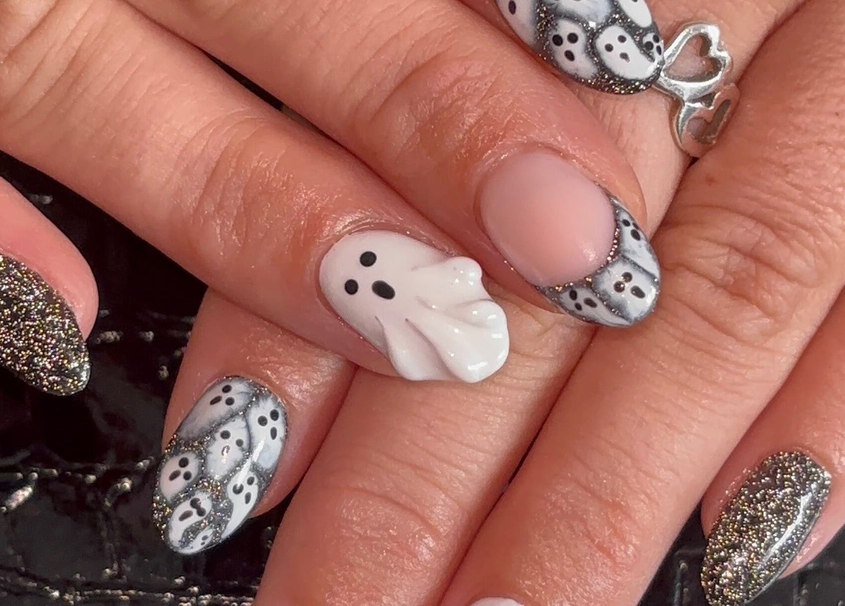Halloween-themed nail art with ghost designs at Beauty by Meka - Home Salon, Kirkcaldy, Scotland, GB.